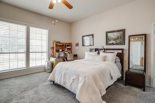 carpeted bedroom with a ceiling fan