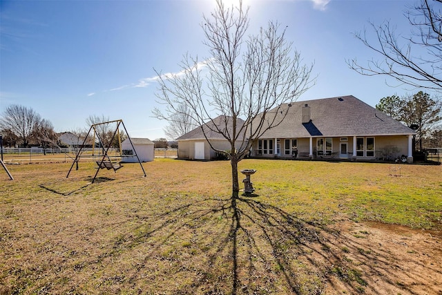 view of yard featuring fence