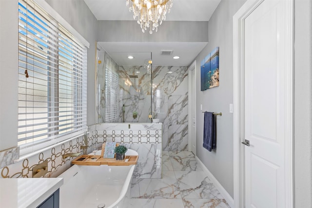 bathroom with marble finish floor, a marble finish shower, a wealth of natural light, a soaking tub, and visible vents