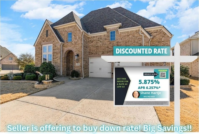 3941 Pine Leaf Ln, Prosper, TX 75078 - view of front of house with brick siding, driveway, a shingled roof, and a garage