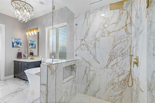 bathroom with a freestanding tub, vanity, marble finish floor, a marble finish shower, and an inviting chandelier