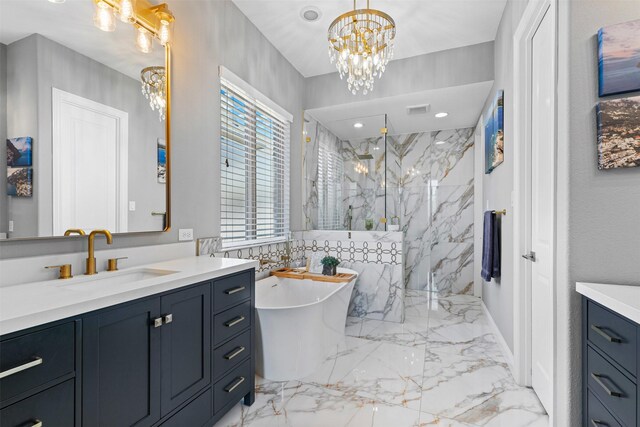 full bath with an inviting chandelier, vanity, a marble finish shower, marble finish floor, and visible vents