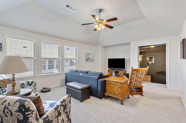 living room with light carpet, visible vents, baseboards, lofted ceiling, and ceiling fan