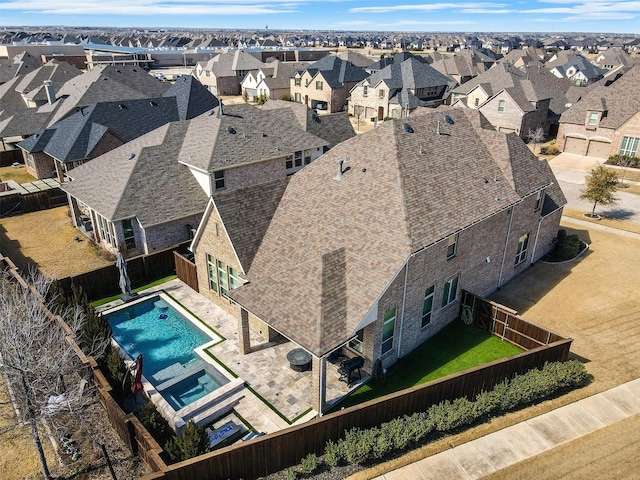 bird's eye view with a residential view