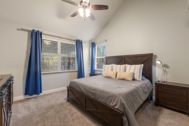 carpeted bedroom with lofted ceiling, ceiling fan, and baseboards