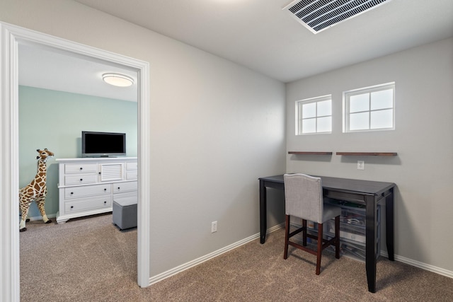 office area with carpet, visible vents, and baseboards