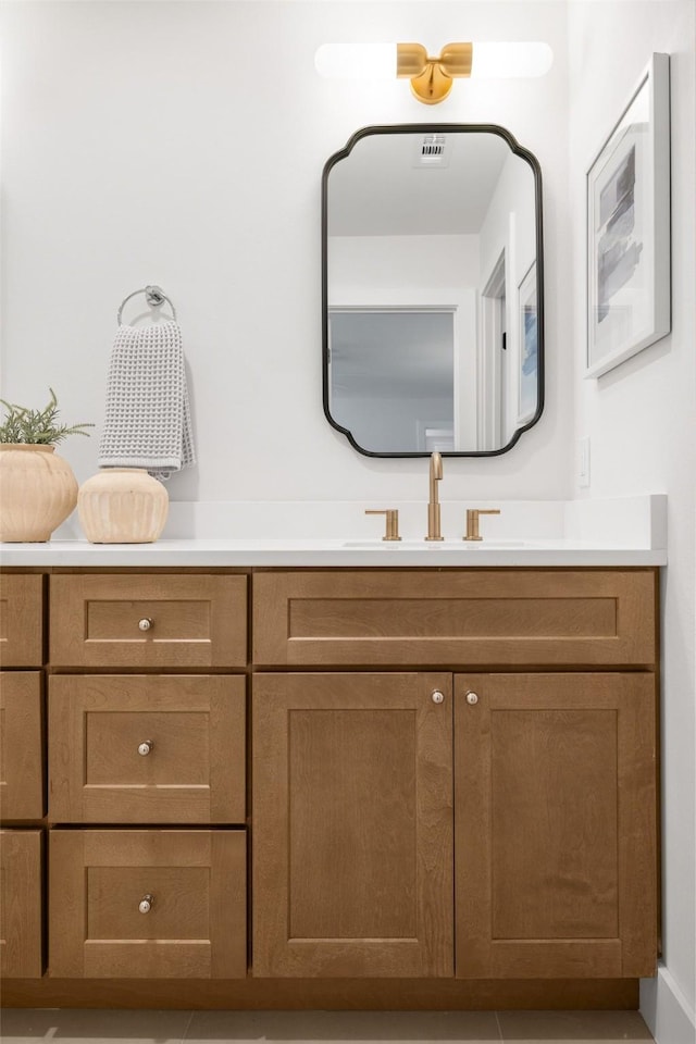 bathroom featuring visible vents and vanity