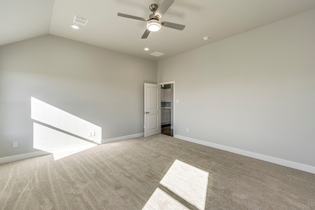 unfurnished bedroom featuring baseboards, visible vents, lofted ceiling, carpet flooring, and recessed lighting