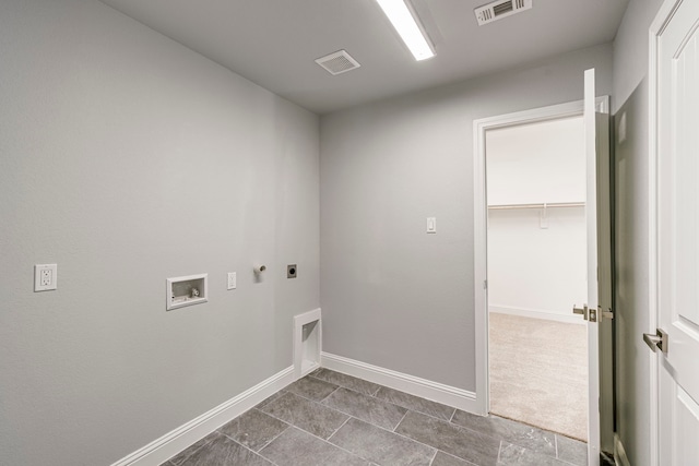 laundry area featuring laundry area, baseboards, visible vents, hookup for a washing machine, and hookup for an electric dryer