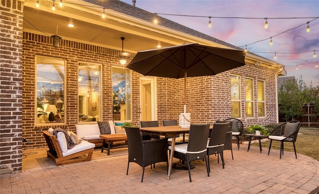 view of patio featuring outdoor dining area and an outdoor living space