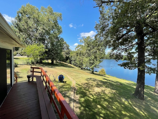 exterior space featuring a water view and a lawn