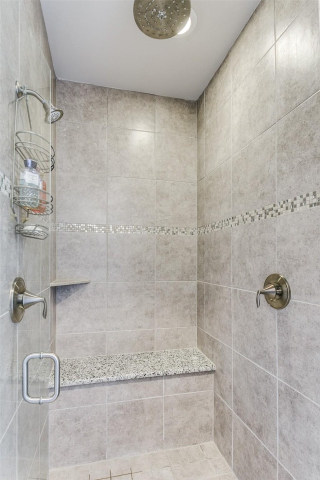 bathroom featuring a stall shower