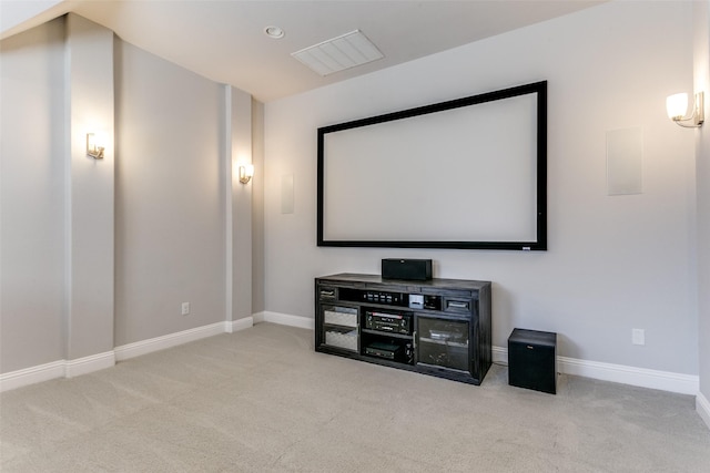 cinema with carpet floors and baseboards