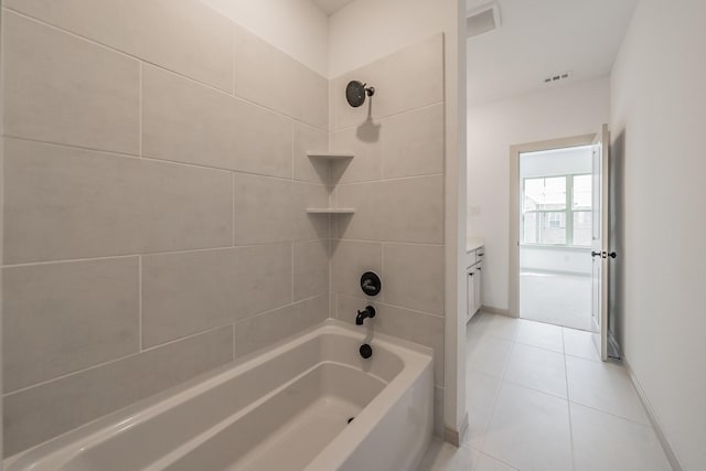 full bathroom with shower / bath combination, tile patterned flooring, baseboards, and vanity