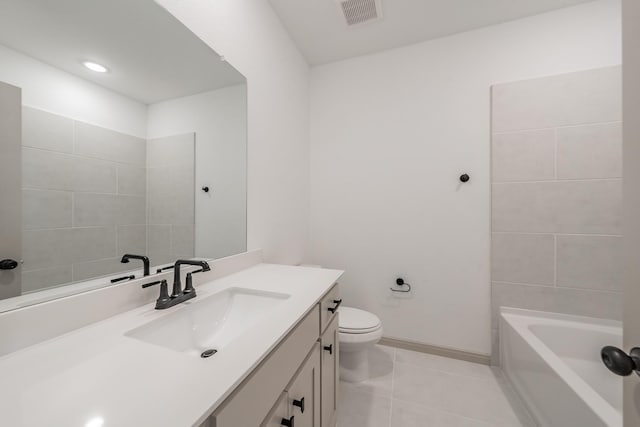 full bathroom featuring toilet, vanity, baseboards, visible vents, and tile patterned floors