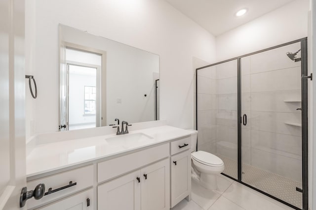 full bath featuring toilet, recessed lighting, vanity, tile patterned floors, and a stall shower