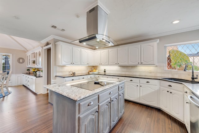 kitchen featuring a sink, white cabinetry, ornamental molding, dishwasher, and island exhaust hood