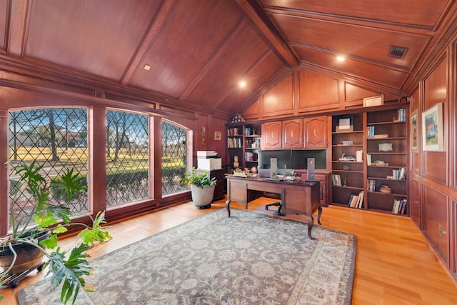 office area featuring vaulted ceiling with beams, a decorative wall, wood ceiling, visible vents, and light wood-style floors