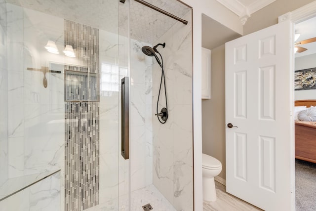 bathroom featuring crown molding, toilet, ensuite bath, and a marble finish shower