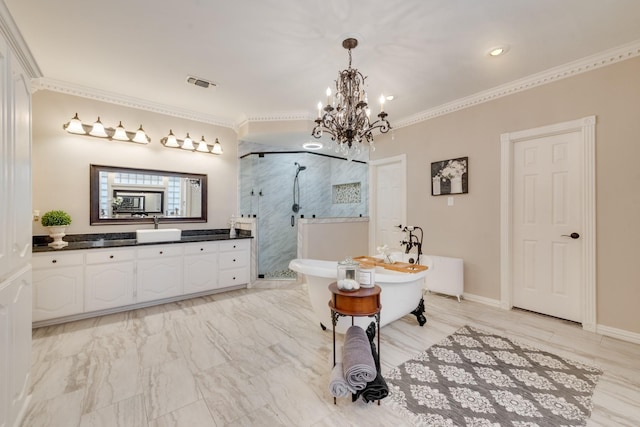 bathroom with ornamental molding, a shower stall, and vanity