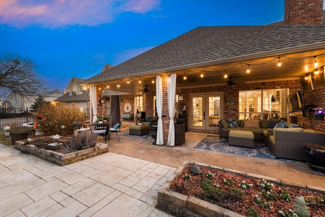 view of patio / terrace with ceiling fan, french doors, outdoor lounge area, and fence