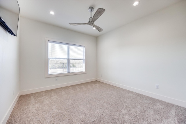 unfurnished room with a ceiling fan, recessed lighting, carpet flooring, and baseboards