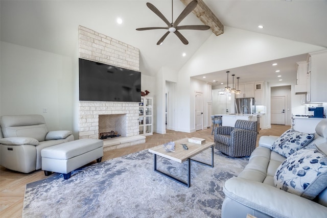 living room featuring ceiling fan, a fireplace, high vaulted ceiling, beam ceiling, and recessed lighting