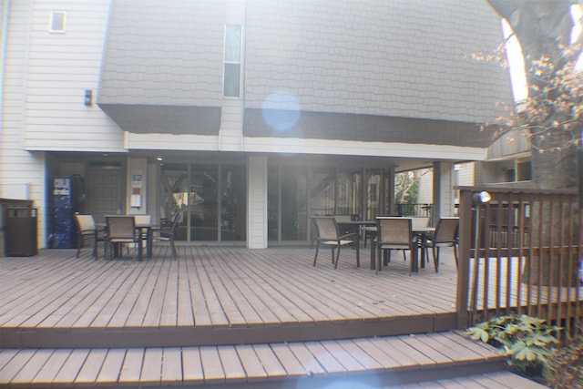 4859 Cedar Springs Rd Unit 147, Dallas, TX 75219 - wooden terrace featuring outdoor dining area