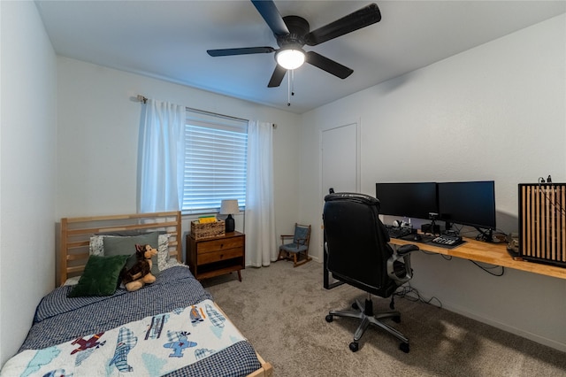 bedroom featuring ceiling fan and carpet floors