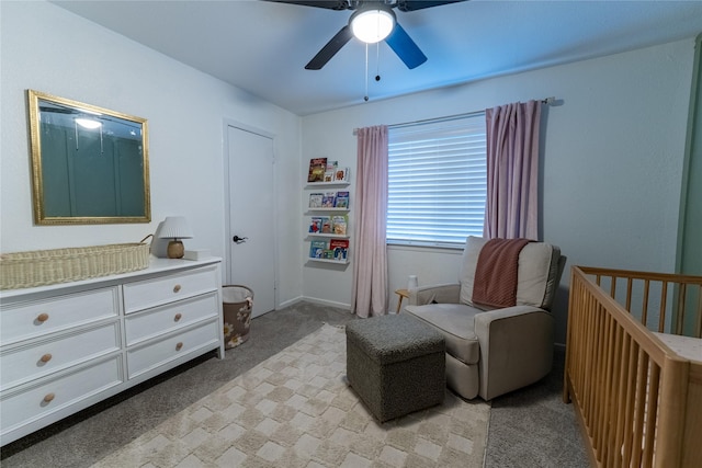 bedroom with a ceiling fan and light colored carpet