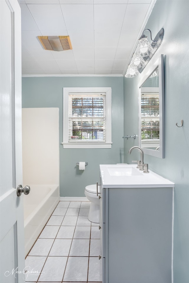 full bathroom featuring visible vents, toilet, vanity, baseboards, and tile patterned floors