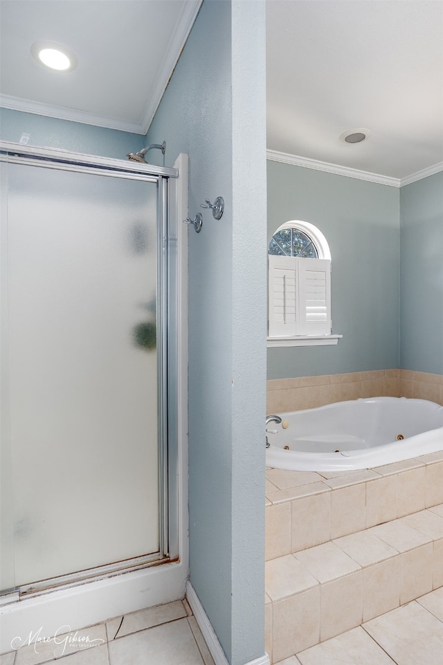 bathroom with a whirlpool tub, a shower stall, crown molding, and tile patterned floors