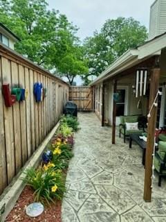 exterior space featuring a fenced backyard