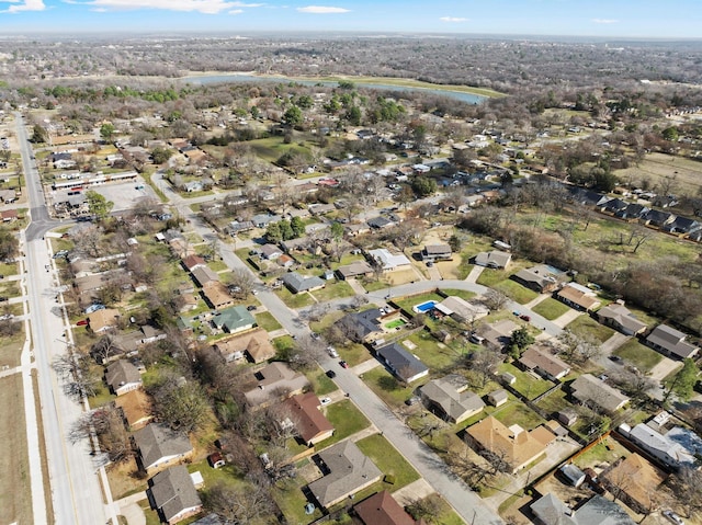 birds eye view of property with a residential view