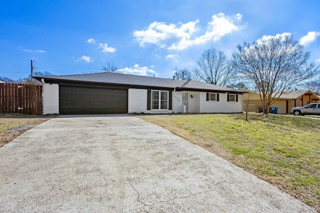 single story home featuring concrete driveway, an attached garage, fence, a front lawn, and brick siding