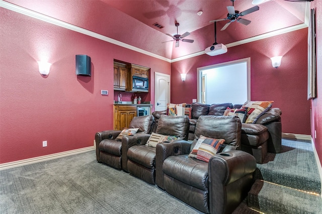 cinema with wet bar, baseboards, visible vents, and carpet flooring