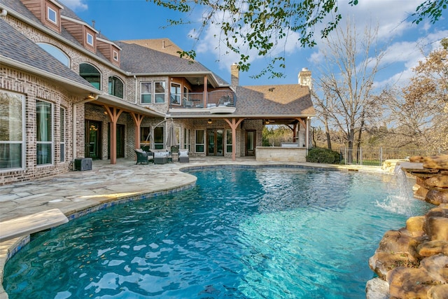 pool with central AC, a patio, and an outdoor hangout area