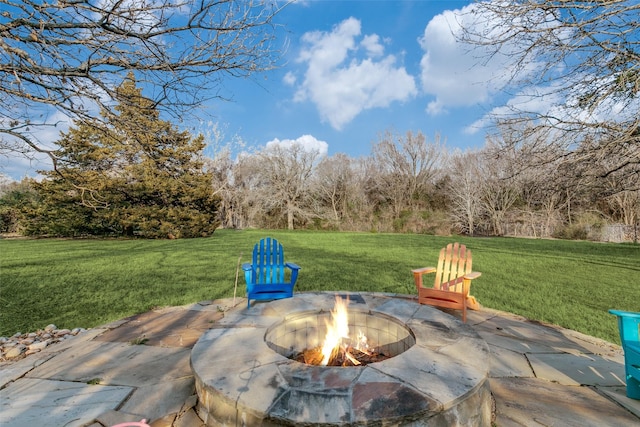 view of patio / terrace featuring a fire pit