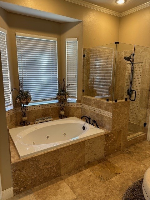 full bathroom with a tub with jets, ornamental molding, and a stall shower