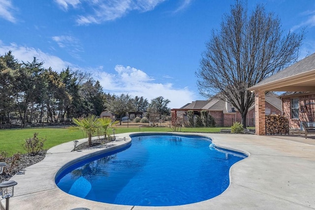 view of pool with a fenced backyard, a fenced in pool, a lawn, and a patio