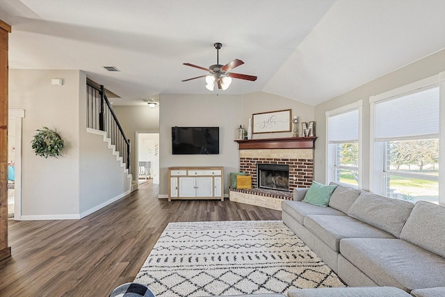 7910 Stone Ridge Dr, Northlake, TX 76247 - living area with dark wood-style floors, baseboards, a ceiling fan, lofted ceiling, and a brick fireplace