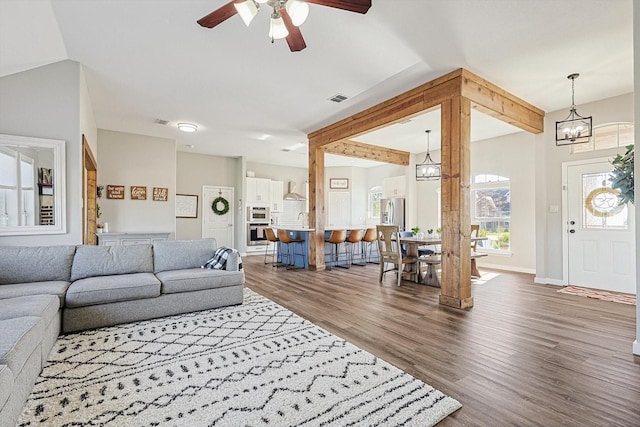 7910 Stone Ridge Dr, Northlake, TX 76247 - living room with wood finished floors, a ceiling fan, vaulted ceiling, and baseboards