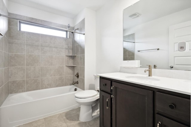 full bathroom with shower / tub combination, toilet, vanity, visible vents, and tile patterned floors