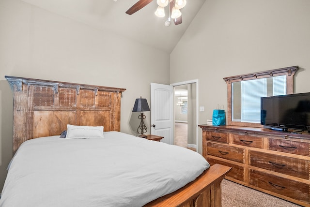 bedroom featuring ceiling fan, carpet floors, and high vaulted ceiling