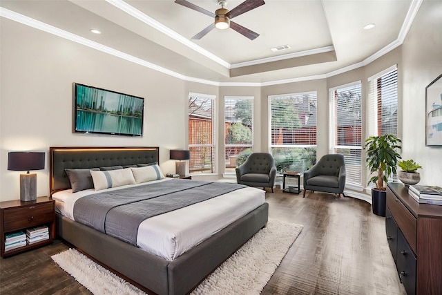 8108 Hazeltine Dr, Plano, TX 75025 - bedroom with a raised ceiling, wood finished floors, multiple windows, crown molding, and recessed lighting
