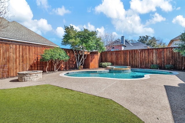 view of pool featuring a patio, an outdoor fire pit, a fenced backyard, a pool with connected hot tub, and a lawn