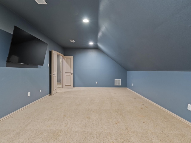 bonus room featuring baseboards, visible vents, carpet flooring, and recessed lighting