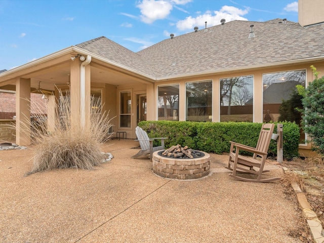 view of patio with an outdoor fire pit