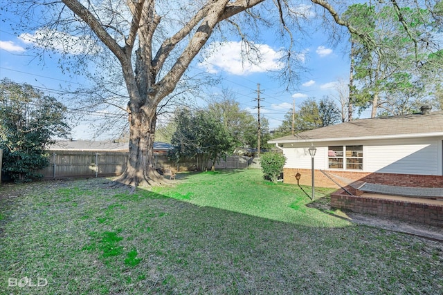 view of yard with fence