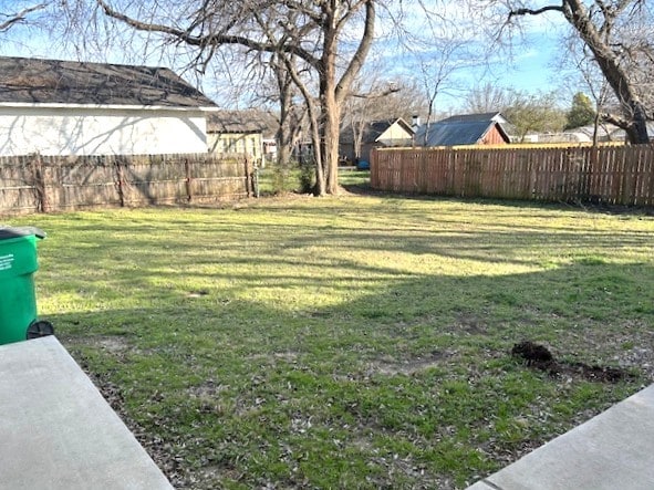 view of yard with fence